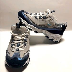 Skechers D'Lites size 6.5 U.S.  These shoes are used but practically New.